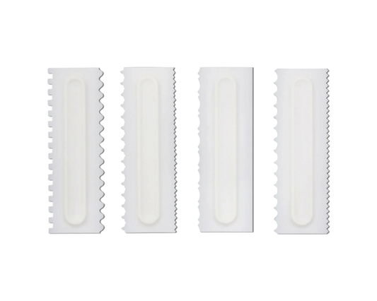 A set of four white scrapers. Each scraper has two sides with different indentations to create patterns when used.
